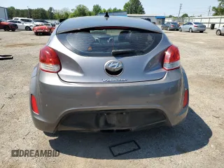2016 Hyundai Veloster z VIN KMHTC6AD4GU273160, wystawiony jako Copart lot #52107985 z przebiegiem 120 884 mil mil oraz Szkoda całkowita • Salvage title. Historia ofert i sprzedaży dostępna na DreamBid. Obrazek 6.
