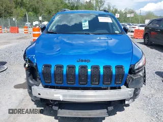 2017 Jeep Cherokee Altitude with VIN 1C4PJLAS7HW663071, listed as a IAAI auction lot 42186905 with 203,296 mi miles and . Bid and sale history available at DreamBid. Image 12.