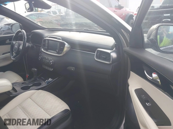 2017 Kia Sorento SX with VIN 5XYPKDA59HG304752, listed as a IAAI auction lot 40931971 with 143,211 mi miles and . Bid and sale history available at DreamBid. Image 5.