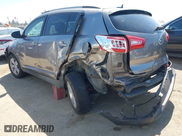 2011 Kia Sportage LX with VIN KNDPBCA20B7170217, listed as a IAAI auction lot 42303069 with 186,994 mi miles and . Bid and sale history available at DreamBid. Image 3.