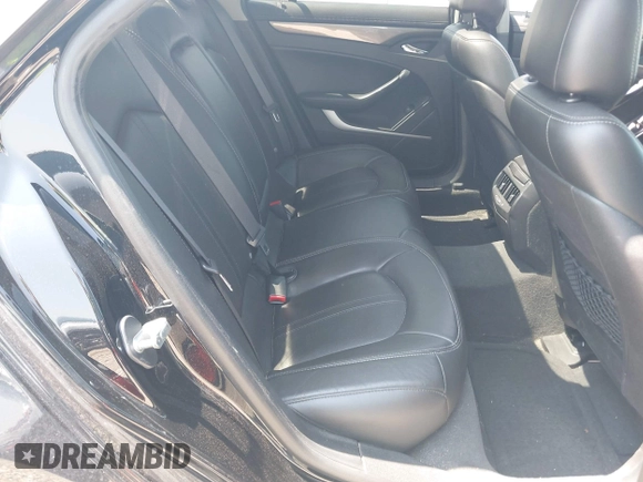 2013 Cadillac CTS Luxury with VIN 1G6DE5E55D0118722, listed as a IAAI auction lot 42448616 with 131,906 mi miles and . Bid and sale history available at DreamBid. Image 8.