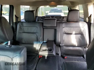 2014 Ford Flex Limited z VIN 2FMGK5D89EBD10509, wystawiony jako Copart lot #57614265 z przebiegiem 174 650 mil mil oraz Szkoda całkowita • Salvage title. Historia ofert i sprzedaży dostępna na DreamBid. Obrazek 10.