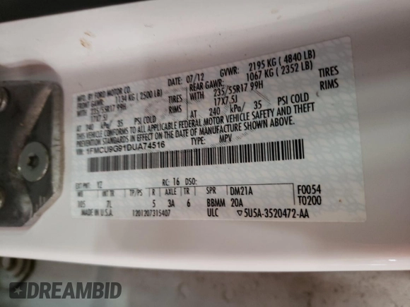 2013 Ford Escape SE with VIN 1FMCU9G91DUA74516, listed as a Copart auction lot 54197845 with 209,473 mi miles and Salvage title. Bid and sale history available at DreamBid. Image 13.