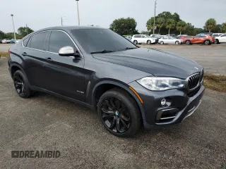2018 BMW X6 xDrive50i with VIN 5UXKU6C5XJ0W39056, listed as a Copart auction lot 75116634 with 90,043 mi miles and Salvage Title. Bid and sale history available at carsss.com. Image 4.