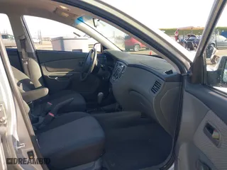 2009 Kia Rio SX with VIN KNADE223296523842, listed as a IAAI auction lot 42024905 with 98,613 mi miles. Bid and sale history available at carsss.com. Image 5.