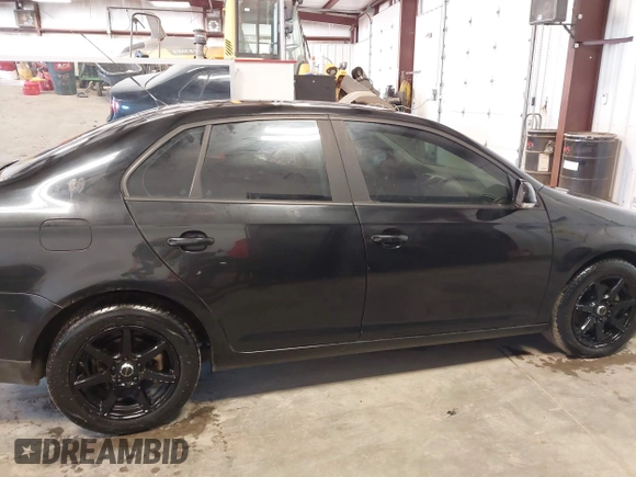 2008 Volkswagen Jetta Sedan S with VIN 3VWJM71K78M153658, listed as a IAAI auction lot 41709377 with 144,467 mi miles. Bid and sale history available at carsss.com. Image 13.