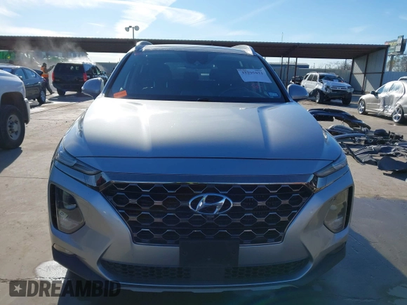 2020 Hyundai Santa Fe Limited with VIN 5NMS53AA6LH301900, listed as a IAAI auction lot 41295933 with 92,359 mi miles and . Bid and sale history available at DreamBid. Image 13.