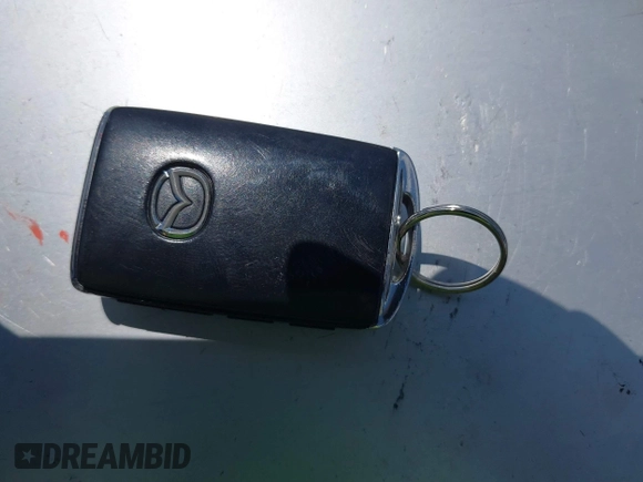2021 Mazda MX-5 Miata Grand Touring z VIN JM1NDAM75M0450871, wystawiony jako IAAI lot #42060495 z przebiegiem 48 670 mil mil oraz . Historia ofert i sprzedaży dostępna na DreamBid. Obrazek 11.