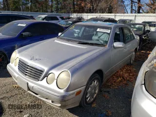 2001 Mercedes-Benz E-Class AWD with VIN WDBJF82J81X059893, listed as a Copart auction lot 80285554 with 156,713 mi miles and Clean Title. Bid and sale history available at carsss.com. Image 1.