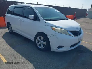 2011 Toyota Sienna LE AAS with VIN 5TDKK3DC1BS040029, listed as a IAAI auction lot 42087897 with 132,843 mi miles. Bid and sale history available at carsss.com. Image 1.