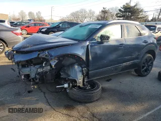 2023 Mazda CX-30 Premium Plus with VIN 3MVDMBEY9PM557107, listed as a Copart auction lot 46893065 with 10,404 mi miles and Salvage title. Bid and sale history available at DreamBid. Image 1.