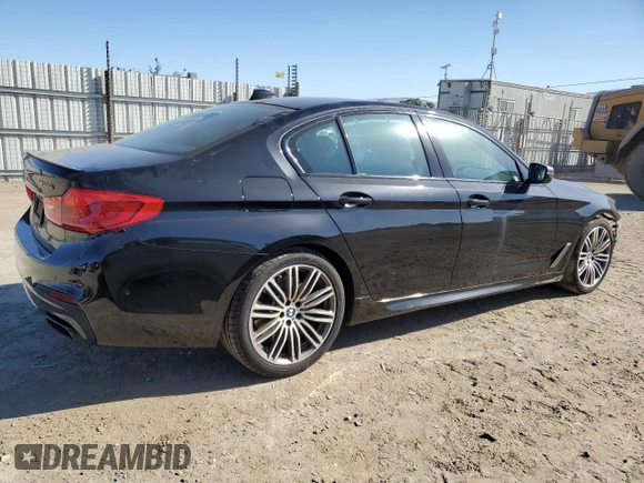2019 BMW 5 Series M550i xDrive with VIN WBAJB9C50KB464503, listed as a Copart auction lot 56995825 with 67,324 mi miles and Salvage title. Bid and sale history available at DreamBid. Image 3.