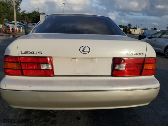 1999 Lexus LS 400 Luxury Sdn with VIN JT8BH28F5X0147574, listed as a Copart auction lot 84227414 with 0 mi miles and Salvage Title. Bid and sale history available at carsss.com. Image 6.