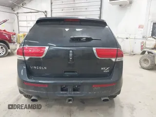 2014 Lincoln MKX with VIN 2LMDJ8JK4EBL16245, listed as a IAAI auction lot 42137824 with 184,479 mi miles. Bid and sale history available at carsss.com. Image 16.