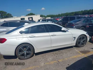 2019 BMW 4 Series 430i z VIN WBA4J1C5XKBM17853, wystawiony jako IAAI lot #39758988 z przebiegiem 38 520 mil mil oraz . Historia ofert i sprzedaży dostępna na DreamBid. Obrazek 13.