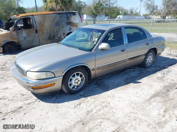 2000 Buick Park Avenue Ultra with VIN 1G4CU5219Y4205854, listed as a IAAI auction lot 41662383 with 211,249 mi miles. Bid and sale history available at carsss.com. Image 2.