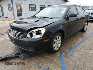 2008 Kia Optima LX z VIN KNAGE124385190474, wystawiony jako Copart lot #51798695 z przebiegiem 151 309 mil mil oraz Szkoda całkowita • Salvage title. Historia ofert i sprzedaży dostępna na DreamBid. Obrazek 1.