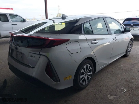 2022 Toyota Prius Prime LE with VIN JTDKAMFP5N3212691, listed as a IAAI auction lot 41443440 with 64,365 mi miles. Bid and sale history available at carsss.com. Image 4.
