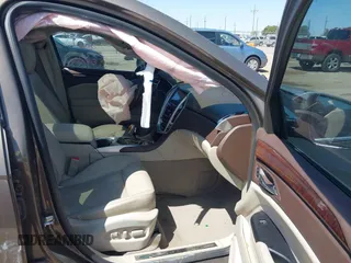 2015 Cadillac SRX Premium Collection with VIN 3GYFNDE32FS569269, listed as a IAAI auction lot 41988807 with 56,481 mi miles. Bid and sale history available at carsss.com. Image 5.