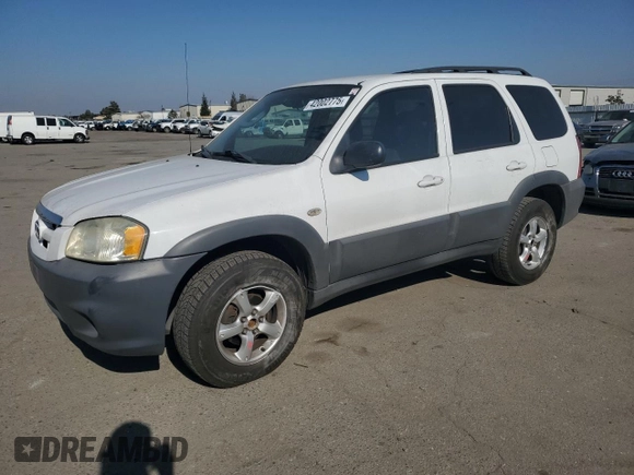 2005 Mazda Tribute i with VIN 4F2YZ02Z95KM24700, listed as a Copart auction lot 42002775 with 128,891 mi miles and Salvage Title. Bid and sale history available at carsss.com. Image 1.