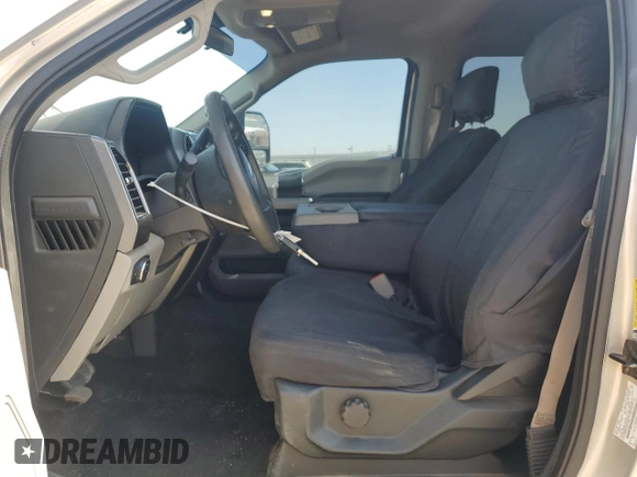 2019 Ford F-250 XL with VIN 1FT7W2BT0KEC17148, listed as a Copart auction lot 61570235 with 101,065 mi miles and Salvage title. Bid and sale history available at DreamBid. Image 7.