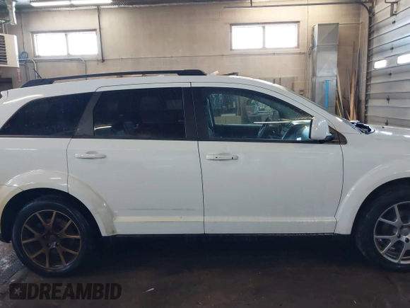 2015 Dodge Journey R/T with VIN 3C4PDDEGXFT574696, listed as a IAAI auction lot 41542460 with 153,044 mi miles and . Bid and sale history available at DreamBid. Image 13.