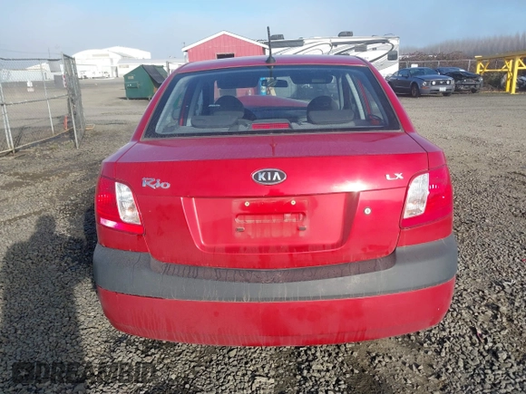 2009 Kia Rio LX with VIN KNADE223796485606, listed as a IAAI auction lot 41676881 with 58,852 mi miles and . Bid and sale history available at DreamBid. Image 16.