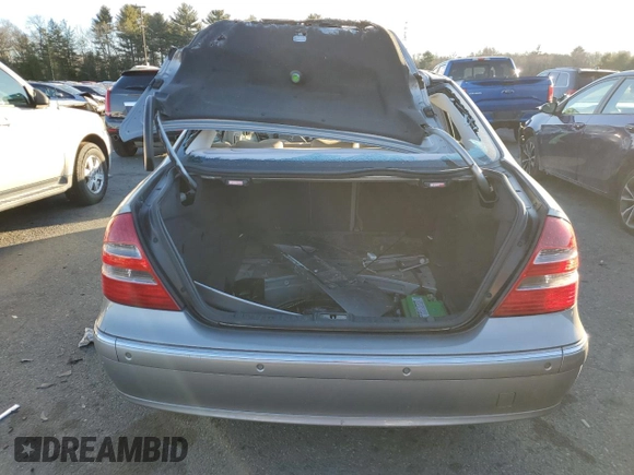 2003 Mercedes-Benz E-Class 5.0L with VIN WDBUF70J53A173768, listed as a Copart auction lot 87950675 with 0 mi miles and Salvage Title. Bid and sale history available at carsss.com. Image 6.