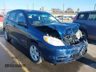 2004 Toyota Matrix Std with VIN 2T1KR32E84C301474, listed as a IAAI auction lot 41410490 with 215,631 mi miles. Bid and sale history available at carsss.com. Image 1.