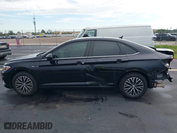 2019 Volkswagen Jetta SEL z VIN 3VWEB7BU2KM273950, wystawiony jako IAAI lot #42414034 z przebiegiem 84 100 mil mil oraz . Historia ofert i sprzedaży dostępna na DreamBid. Obrazek 14.