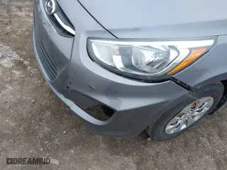 2015 Hyundai Accent GLS with VIN KMHCT4AE0FU929088, listed as a IAAI auction lot 41993359 with 149,958 mi miles. Bid and sale history available at carsss.com. Image 12.