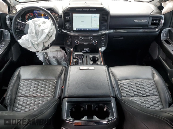 2021 Ford F-150 XL with VIN 1FTFW1E52MFB31825, listed as a Copart auction lot 61462735 with 76,653 mi miles and Salvage title. Bid and sale history available at DreamBid. Image 8.