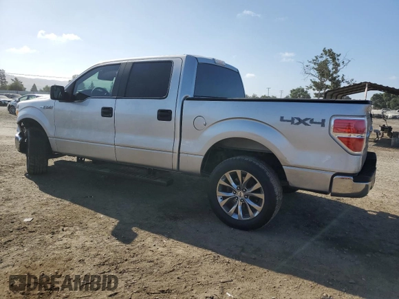 2014 Ford F-150 XL with VIN 1FTFW1EF5EKE57295, listed as a Copart auction lot 61687195 with 123,852 mi miles and Salvage title. Bid and sale history available at DreamBid. Image 2.