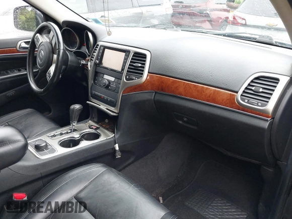 2011 Jeep Grand Cherokee Limited with VIN 1J4RR5GG3BC528737, listed as a IAAI auction lot 42752240 with 182,491 mi miles and . Bid and sale history available at DreamBid. Image 5.