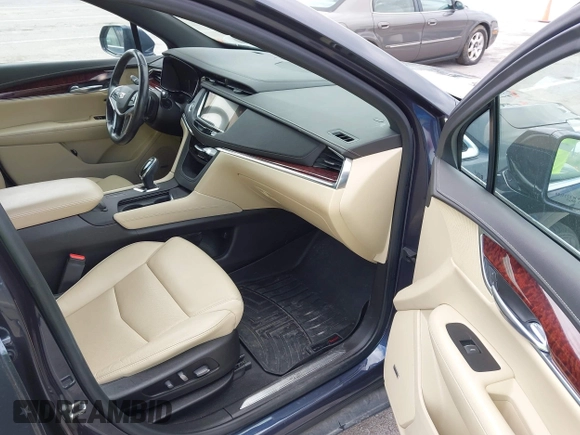 2019 Cadillac XT5 Luxury FWD with VIN 1GYKNCRS7KZ199542, listed as a IAAI auction lot 42032139 with 79,487 mi miles and . Bid and sale history available at DreamBid. Image 5.