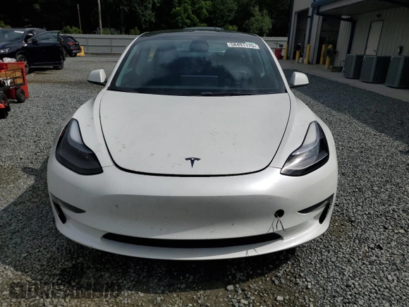 2023 Tesla Model 3 z VIN 5YJ3E1EA0PF452595, wystawiony jako Copart lot #58491175 z przebiegiem 40 288 mil mil oraz Szkoda całkowita • Salvage title. Historia ofert i sprzedaży dostępna na DreamBid. Obrazek 5.