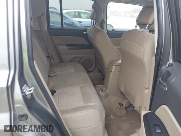 2014 Jeep Patriot Latitude with VIN 1C4NJPFAXED507693, listed as a IAAI auction lot 41701193 with 104,130 mi miles and . Bid and sale history available at DreamBid. Image 8.