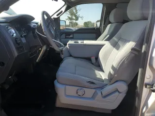 2014 Ford F-150 XL with VIN 1FTFW1EF5EKE57295, listed as a Copart auction lot 61687195 with 123,852 mi miles and Salvage title. Bid and sale history available at DreamBid. Image 7.