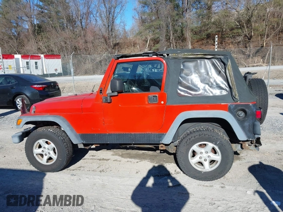 2006 Jeep Wrangler SE with VIN 1J4FA29S16P712101, listed as a IAAI auction lot 41347042 with 129,063 mi miles. Bid and sale history available at carsss.com. Image 14.