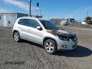 2010 Volkswagen Tiguan with VIN WVGBV9AX0AW536452, listed as a IAAI auction lot 42174637 with 180,465 mi miles and . Bid and sale history available at DreamBid. Image 1.