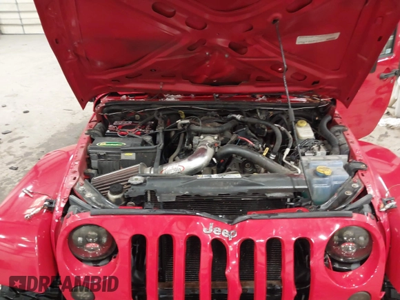 2011 Jeep Wrangler Sahara with VIN 1J4AA5D10BL593534, listed as a IAAI auction lot 41551416 with 101,716 mi miles and . Bid and sale history available at DreamBid. Image 10.