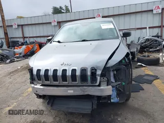 2014 Jeep Cherokee Sport with VIN 1C4PJLAB1EW314418, listed as a IAAI auction lot 41935643 with 177,262 mi miles and . Bid and sale history available at DreamBid. Image 6.
