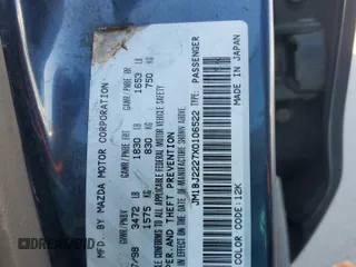 1999 Mazda Protege DX z VIN JM1BJ2227X0106522, wystawiony jako Copart lot #52423565 z przebiegiem 206 260 mil mil oraz Szkoda całkowita • Salvage title. Historia ofert i sprzedaży dostępna na DreamBid. Obrazek 12.