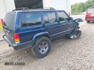 2001 Jeep Cherokee Sport with VIN 1J4FT48S71L525856, listed as a IAAI auction lot 42349383 with 218,122 mi miles and . Bid and sale history available at DreamBid. Image 4.