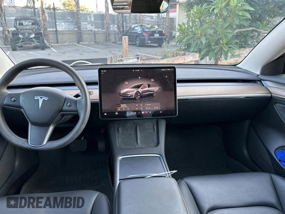 2023 Tesla Model 3 with VIN 5YJ3E1EA1PF607137, listed as a Copart auction lot 62613375 with 27,271 mi miles and Clean title. Bid and sale history available at DreamBid. Image 9.
