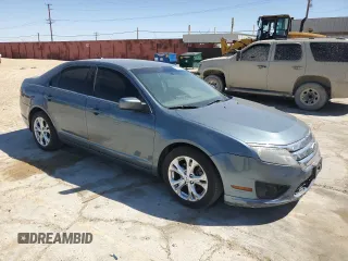 2012 Ford Fusion SE z VIN 3FAHP0HA0CR213729, wystawiony jako Copart lot #52458665 z przebiegiem 107 419 mil mil oraz Czysty tytuł • Clean title. Historia ofert i sprzedaży dostępna na DreamBid. Obrazek 4.
