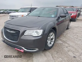 2015 Chrysler 300 Limited with VIN 2C3CCAAG4FH814179, listed as a IAAI auction lot 42058849 with 167,946 mi miles. Bid and sale history available at carsss.com. Image 2.
