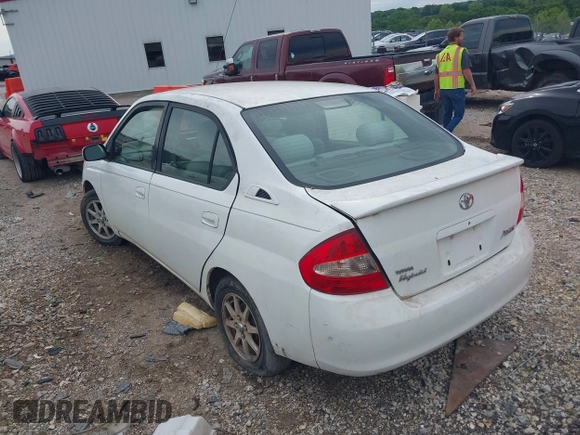 2003 Toyota Prius z VIN JT2BK12U330083316, wystawiony jako IAAI lot #42165606 z przebiegiem 113 454 mil mil oraz . Historia ofert i sprzedaży dostępna na DreamBid. Obrazek 3.