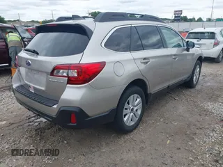 2018 Subaru Outback Premium with VIN 4S4BSAFC4J3218304, listed as a IAAI auction lot 42335512 with 91,320 mi miles and . Bid and sale history available at DreamBid. Image 4.