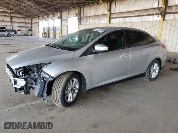 2015 Ford Focus SE with VIN 1FADP3F20FL232196, listed as a Copart auction lot 64829835 with 31,294 mi miles and Salvage title. Bid and sale history available at DreamBid. Image 1.